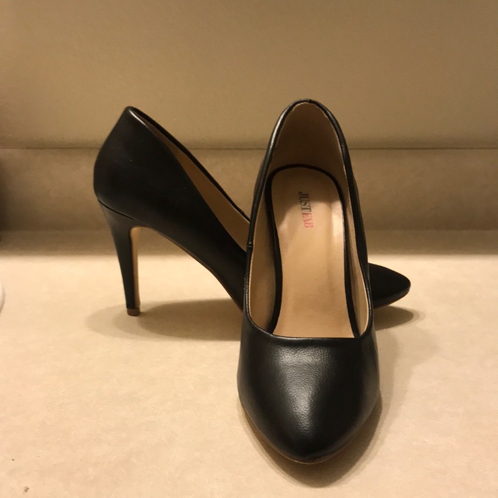 Simple black faux leather pumps